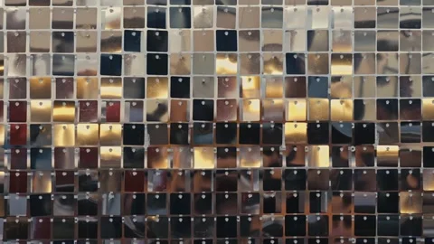 Gold and Silver Sequin Shimmer Wall Backdrop Reflecting Light in Abstract Stock Footage 343003469