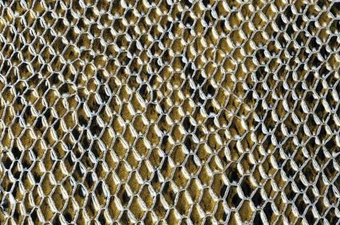 Gold artificial texture, honeycomb pattern Stock Photos