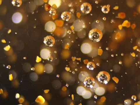 Gold balls bubbles abstract macro different ways colors Fotos Stock