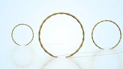 Gold Bangles on a Light Reflective Floor. Jewelry Items 3D Animation. 4K Stock Footage 305668563