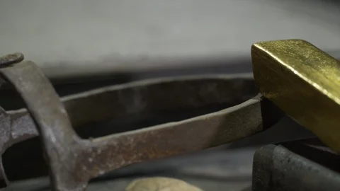 Gold bar and casting tools - 4K UHD Stock Footage 91677902