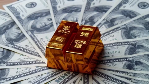 Gold Bar On Background Of US One Hundred Dollar Bills Investment Concept Stock Footage 326173086