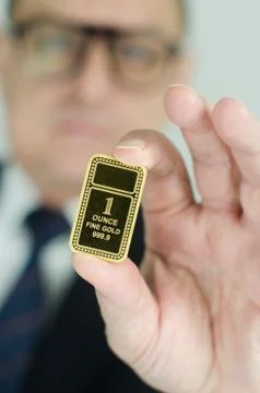 Gold bar ingot Stock Photos