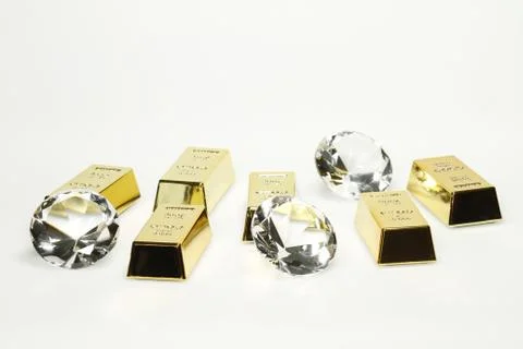 Gold bars and diamonds Stock Photos