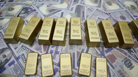 Gold Bars and US Dollar Bills Showcase of Wealth, Investment, and Financial.. Stock Footage 310586052