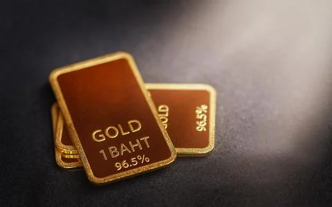Gold bars on black background Stock Photos