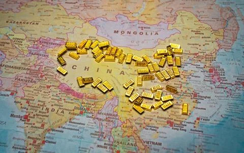 Gold bars on China map wealth and economy concept. Stock Photos
