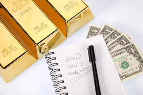 Gold bars on graphs and statistics Stock Photos