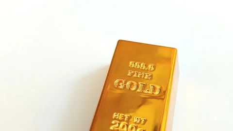 Gold bars on an isolated white background Stock Footage 325015560