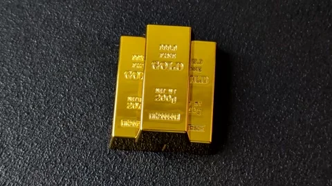 Gold bars or ingots as a metal for bank storage, investments, and financial tran Stock Footage 332810358