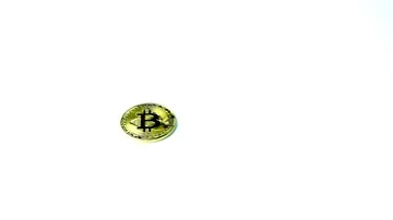 Gold Bitcoin BTC cryptocurrency crypto currency bit coin loop white background Stock Footage 85682791