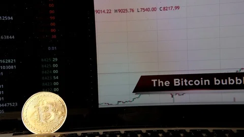 Gold bitcoin BTC cryptocurrency in front of market crash graph alert Stock Footage 85718194