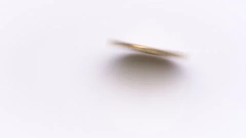 Gold bitcoin BTC rotating or rotates isolated on white background close-up Stock Footage 148723572