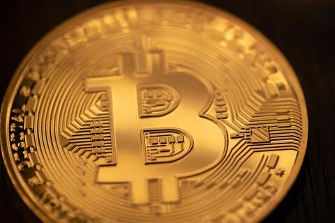 Gold Bitcoin closeup view. Crypto currency and Blockchain concept. Digital Money Stock-Fotos