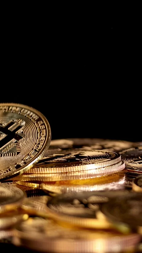 Gold Bitcoin Coin Dropping Onto Stack of Cryptocurrency Tokens Stock Footage 316801840