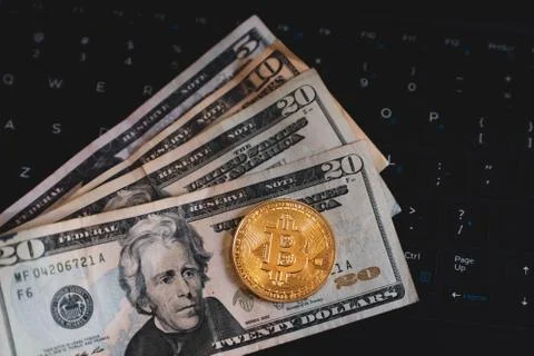 Gold Bitcoin Cryptocurrency Token on Computer Laptop Stock Photos