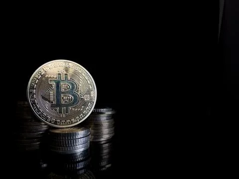 Gold bitcoin on dark background, Close up of a shiny Bitcoin BTC Cryptocurr.. Stock Photos