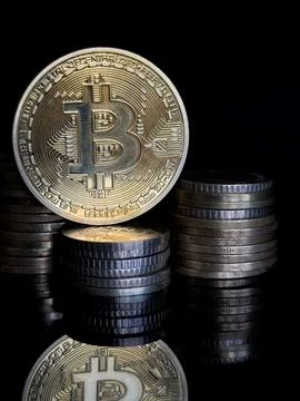 Gold bitcoin on dark background, Close up of a shiny Bitcoin BTC Cryptocurr.. Stock Photos