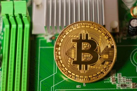 Gold Bitcoin electronic computer processor board 写真素材