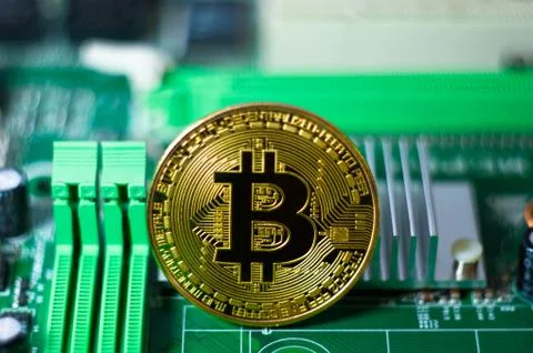 Gold Bitcoin electronic computer processor board Stock Photos