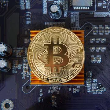 Gold Bitcoin electronic computer processor board 写真素材