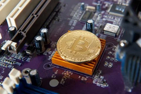 Gold Bitcoin electronic computer processor board Stock Photos