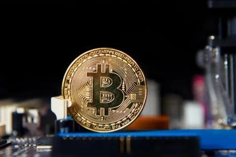 Gold Bitcoin electronic computer processor board Stock Photos