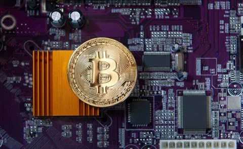 Gold Bitcoin electronic computer processor board Stock Photos