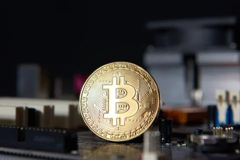 Gold Bitcoin electronic computer processor board 写真素材