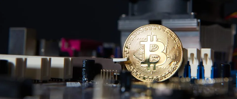 Gold Bitcoin electronic computer processor board Stock Photos