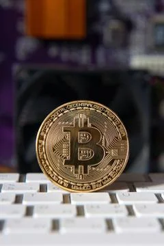 Gold Bitcoin electronic computer processor board 写真素材