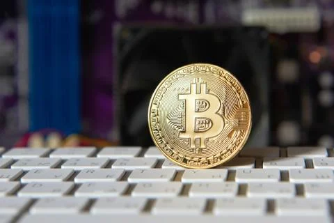 Gold Bitcoin electronic computer processor board Stock Photos