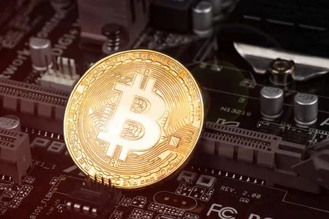 Gold Bitcoin electronic computer processor board 写真素材