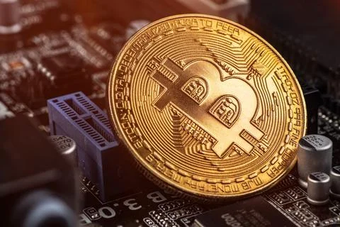 Gold Bitcoin electronic computer processor board 写真素材