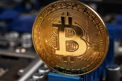 Gold Bitcoin electronic computer processor board Stock Photos