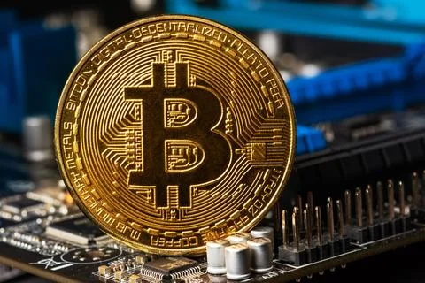 Gold Bitcoin electronic computer processor board 写真素材