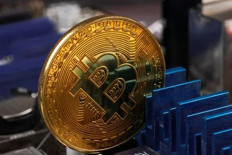 Gold Bitcoin electronic computer processor board 写真素材