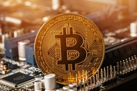 Gold Bitcoin electronic computer processor board Stock Photos