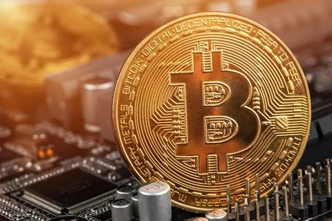 Gold Bitcoin electronic computer processor board 写真素材