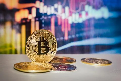 Gold bitcoin with trading graph chart in background Virtual cryptocurrency .. Stock Photos