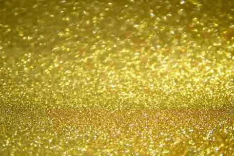 Gold blurred background. Stock Photos