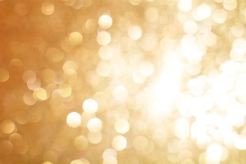 Gold Bokeh Background. The background with boke. Stock Photos