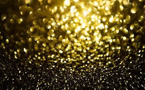 Gold bokeh background for creative banner. Golden bokeh on shiny texture. G.. Stock Photos