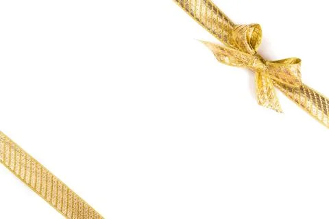 Gold bow isolated on white background. Stock Photos