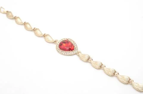 Gold bracelet with ruby isolated on white Stock Photos