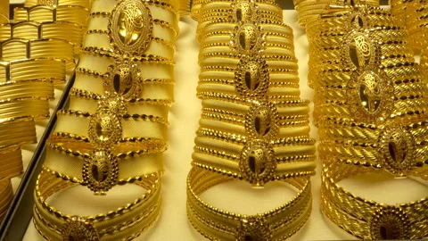 Gold bracelets in a showcase in 4K Stock Footage 152975339