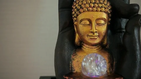 Gold buddha face statue wall background hd footage Stock Footage 113190209