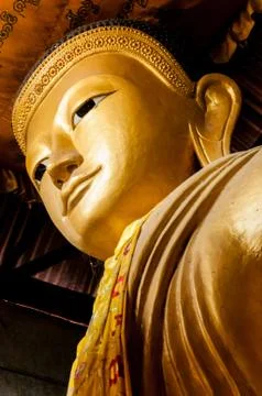 Gold Buddha Head from below Stock Photos