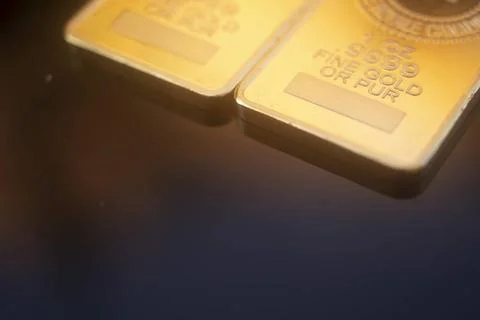 Gold bullion ingot bar Solid pure 999.9 gold bullion ingot bars photo. Cop... Stock Photos