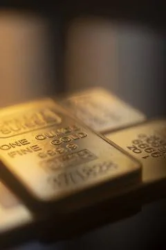 Gold bullion ingot bar Solid pure 999.9 gold bullion ingot bars photo. Cop... Stock Photos